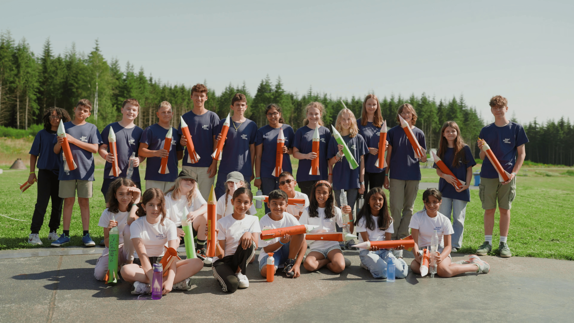 Group of campers with their water rockets