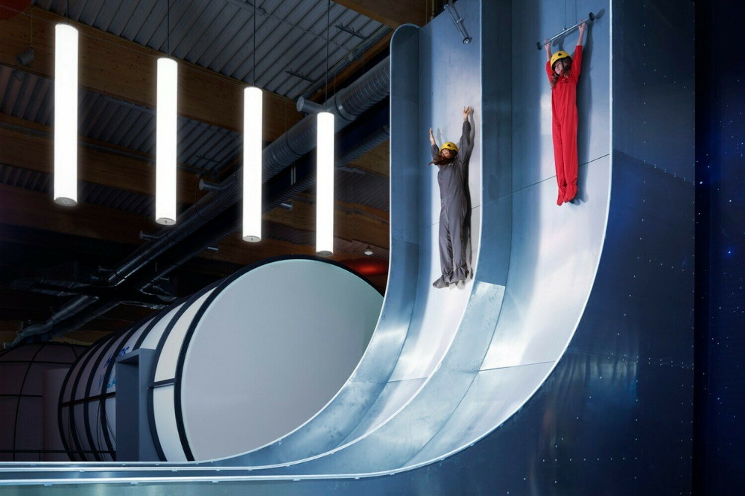 Participants on the Free Fall Slide, an immersive activity at the Euro Space Center.